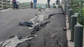কোটি টাকার সেতু উদ্বোধনের আগেই সংযোগ সড়কে ধস