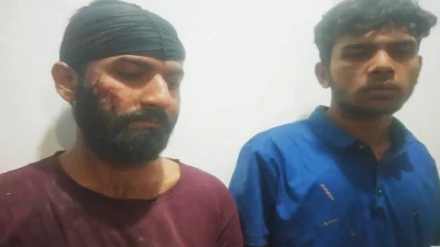 শার্শায় গণপিটুনির শিকার দুই ছিনতাইকারী। ছবি: এম এ রহিম