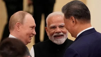 ভ্লাদিমির পুতিন, নরেন্দ্র মোদি ও শি জিনপিং। ছবি: রয়টার্স